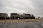 NS SD60E Locomotive leading a train